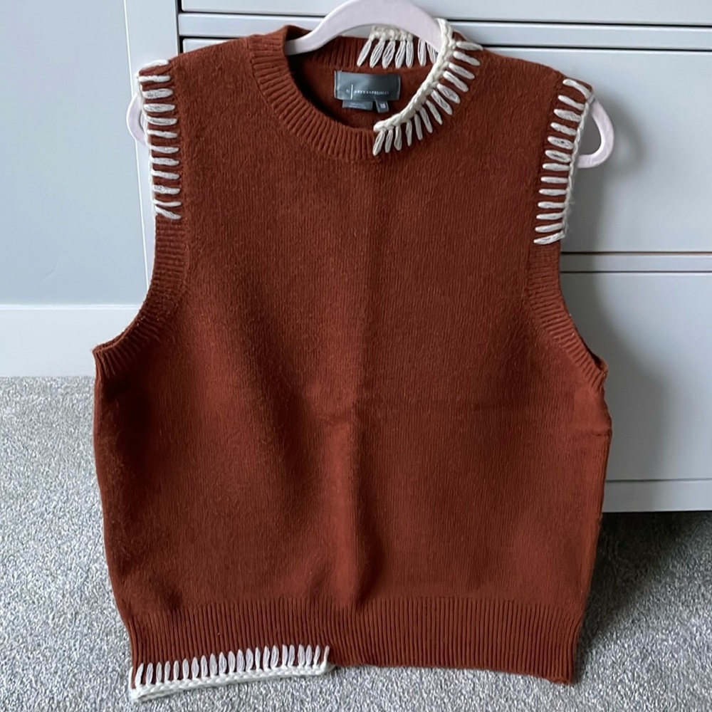 Anthropologie rust colored one size sweater vest.